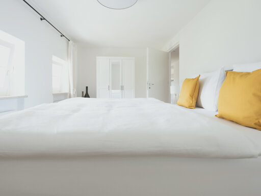 Huberhof: helle Schlafzimmer in den Apartments